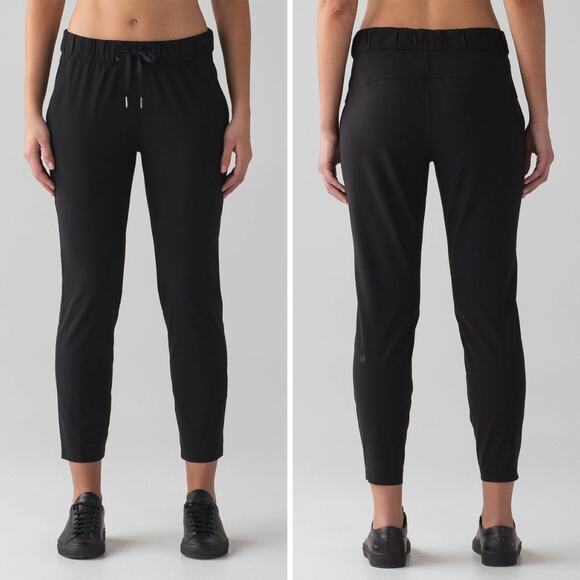 Lululemon On The Fly Pant Woven 28" WOMENS 8 Black Joggers Travel Pockets EUC - Picture 1 of 12